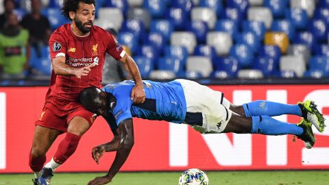 Kalidou Koulibaly puts in an unorthodox challenge to halt Mohamed Salah.