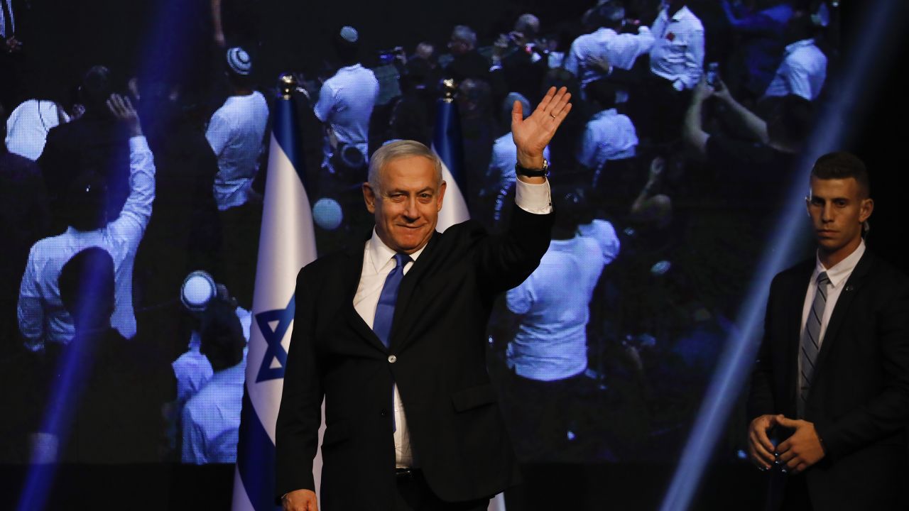 Benjamin Netanyahu addresses his supporters at the Likud Party headquarters after elections in Tel Aviv.