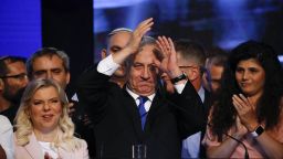 Israeli Prime Minister Benjamin Netanyahu addressees his supporters at party headquarters after elections in Tel Aviv, Israel, Wednesday, Sept. 18, 2019. (AP Photo/Ariel Schalit)