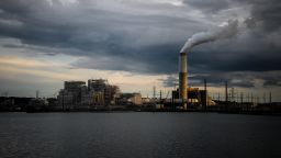 Emissions rise from the Duke Energy Corp. coal-fired Asheville Power Plant ahead of Hurricane Florence in Arden, North Carolina, U.S., on Thursday, Sept. 13, 2018. Hurricane Florences wrath hit the North Carolina coast, but the full effects of the storm, still centered 100 miles from shore, are yet to come. Photographer: Charles Mostoller/Bloomberg via Getty Images
