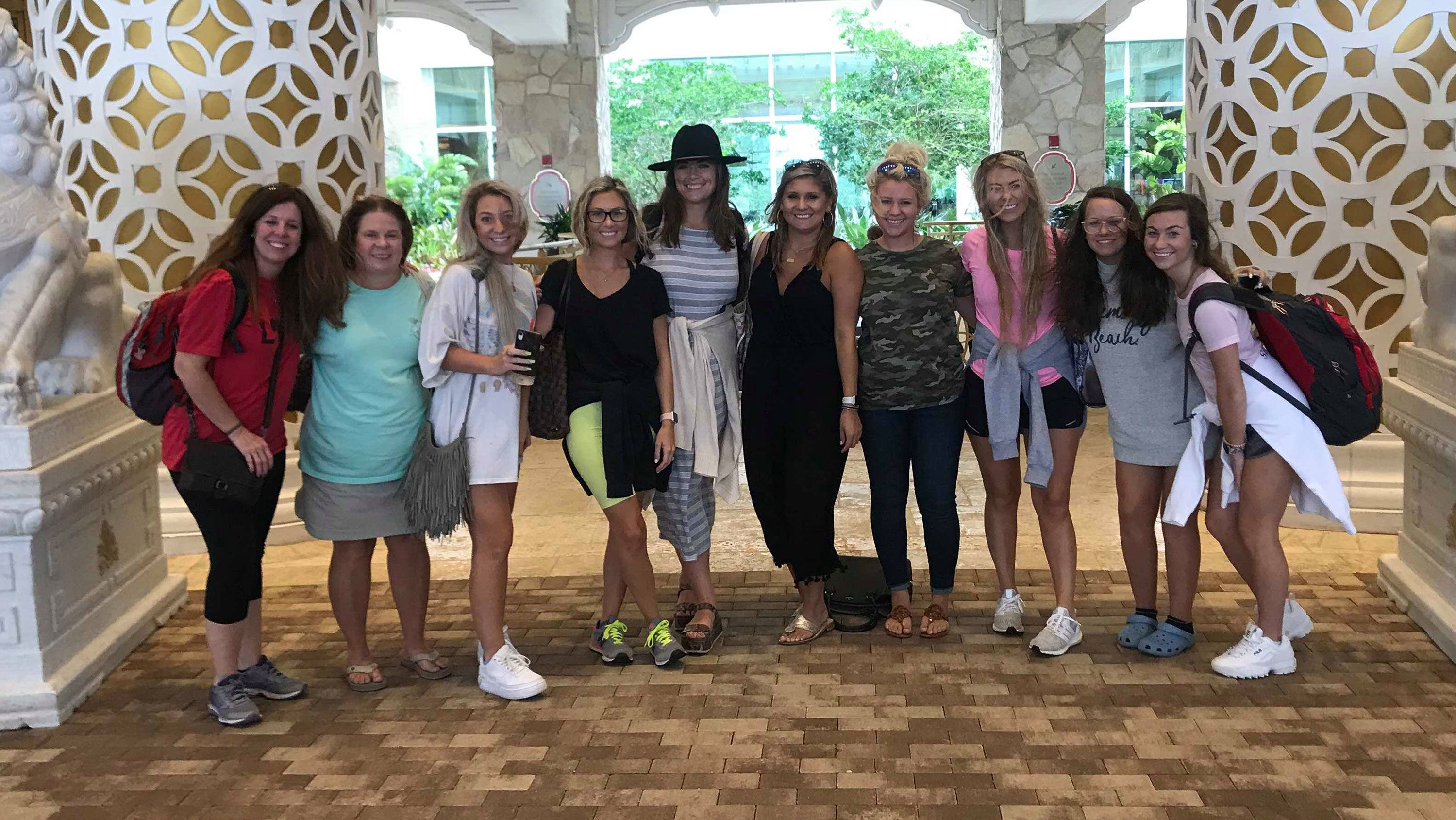The bride to be, Rikki Kahley, fourth from left, poses with her bachelorette party, including her mother, Sandy Gibbs Kahley, second from left, and sister Chloe, third from left.