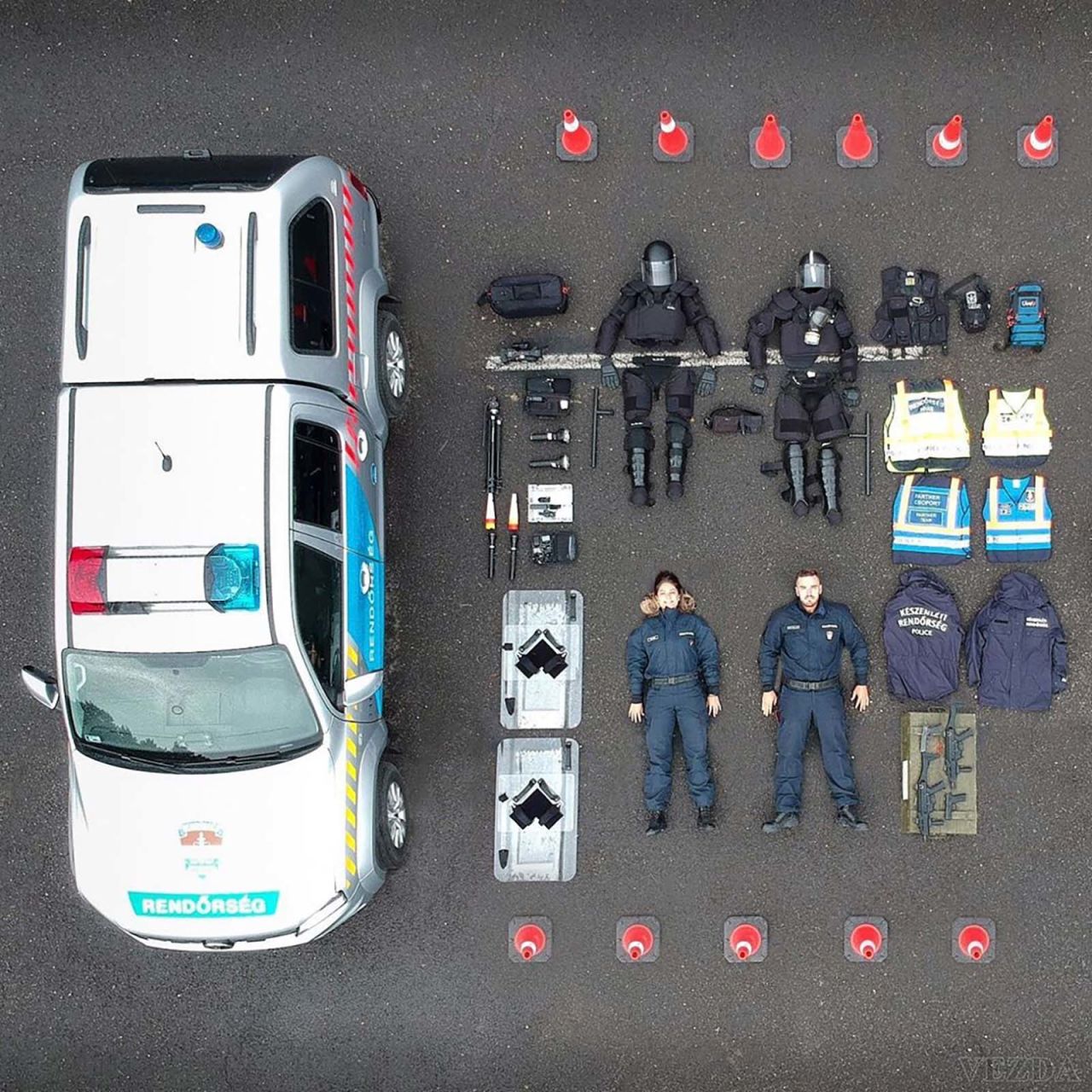 Hungarian police display a patrol car and its contents.