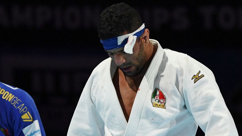 In this picture taken on August 28, 2019, Iran's Saeid Mollaei (in white) fights against Belgium's Matthias Casse during the semi-final of the men's under 81kg category during the 2019 Judo World Championships at the Nippon Budokan, a venue for the upcoming Tokyo 2020 Olympic Games, in Tokyo. - Iranian judo star Saeid Mollaei, who claimed he was ordered to deliberately lose a world championship fight, could compete under a refugee flag at the 2020 Tokyo Olympics, officials said on September 1. (Photo by Charly TRIBALLEAU / AFP)        (Photo credit should read CHARLY TRIBALLEAU/AFP/Getty Images)