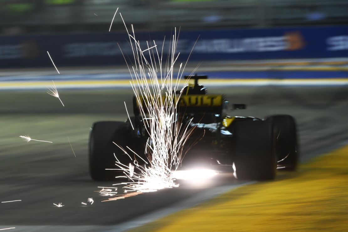 Nico Hulkenberg of Renault triggers sparks at a practice session at the Marina Bay Circuit, Singapore, 2018.