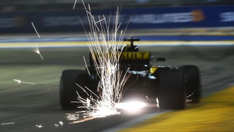 Nico Hulkenberg of Renault triggers sparks at a practice session at the Marina Bay Circuit, Singapore, 2018.