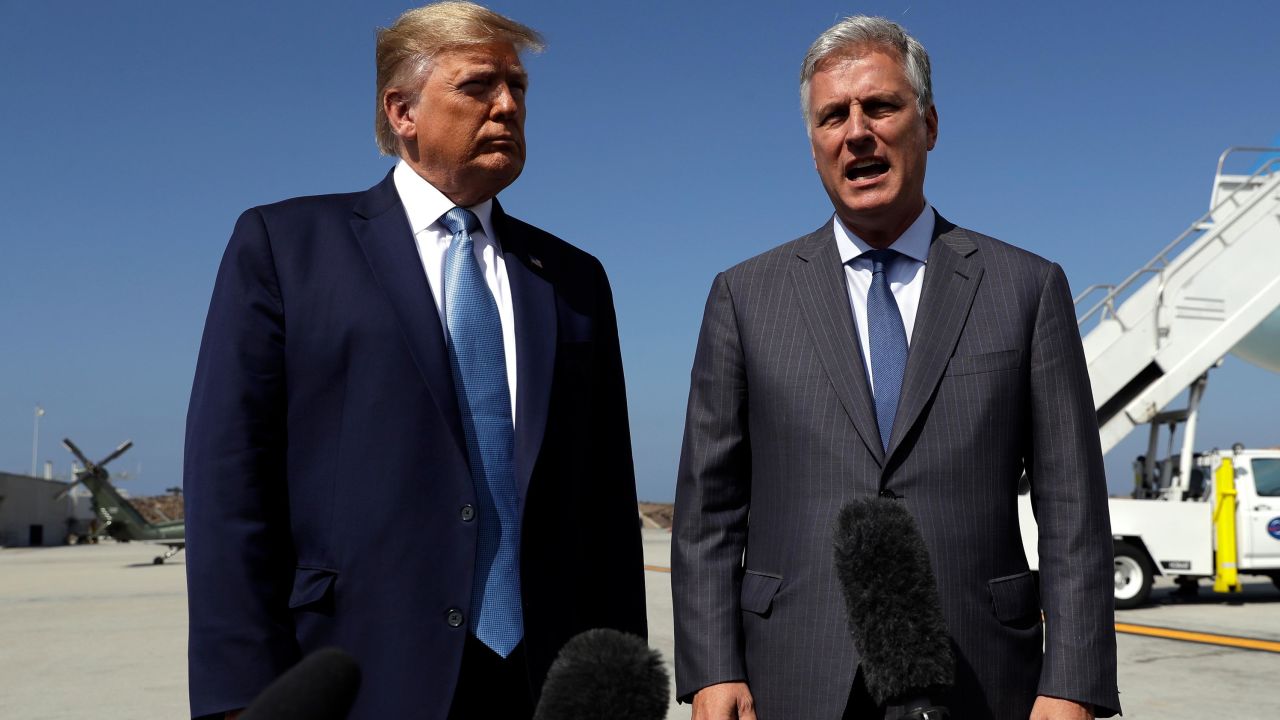 President Donald Trump and Robert O'Brien, just named as the new national security adviser, speak to the media at Los Angeles International Airport, Wednesday, September 18, 2019, in Los Angeles. 