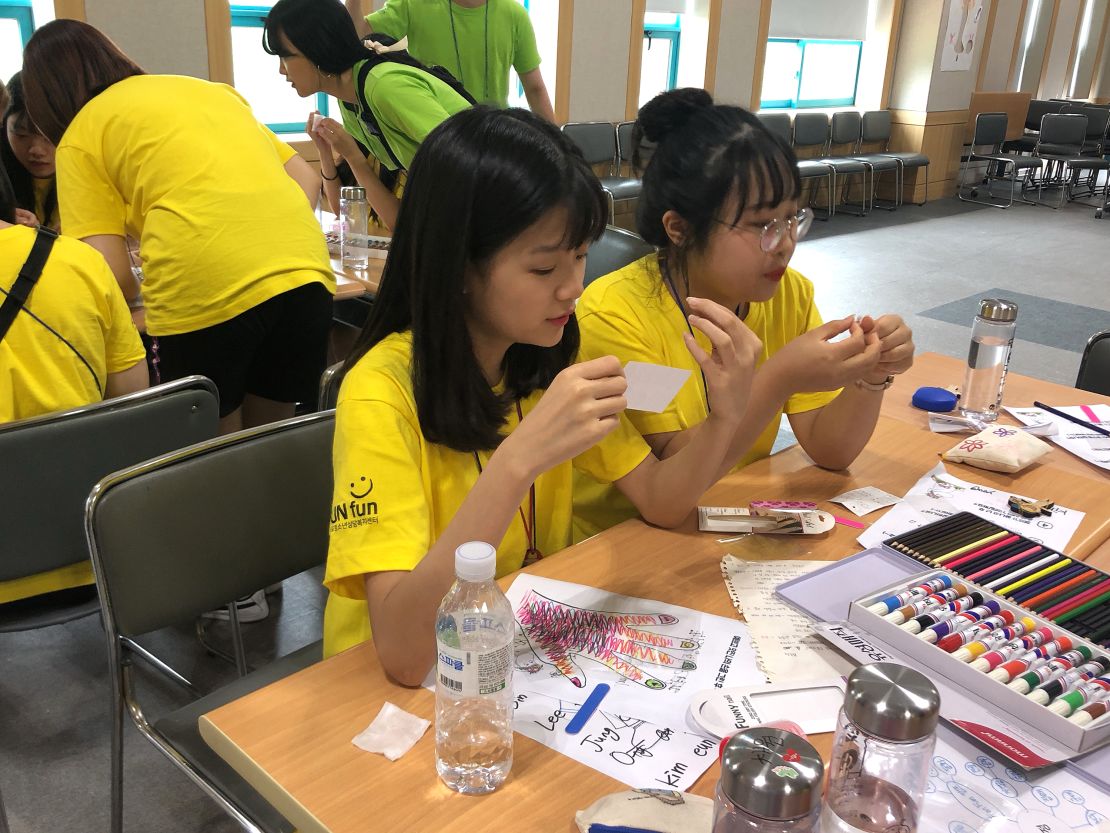 Campers decorate their nails at a government-sponsored smartphone addiction camp in Cheonan, South Korea in July, 2019.