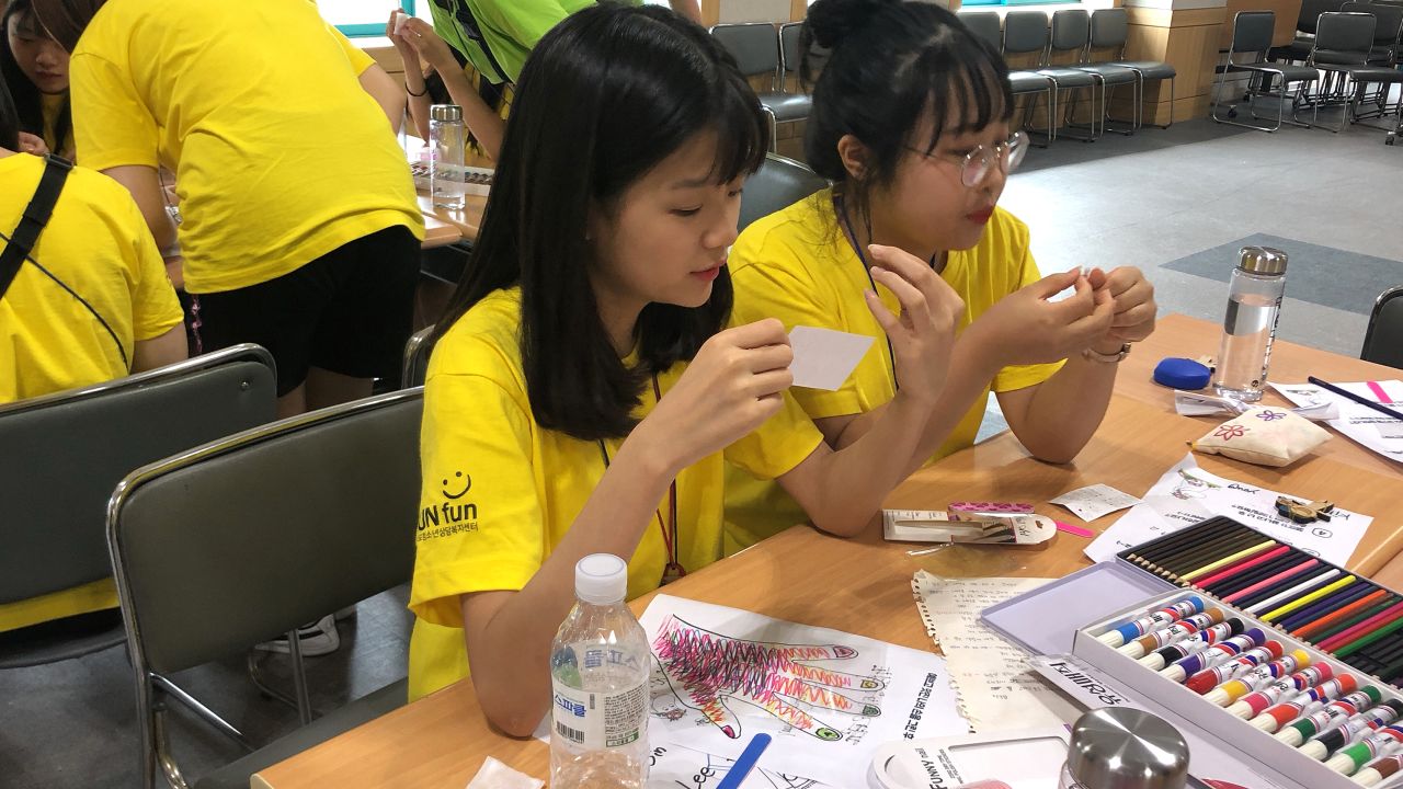Campers decorate their nails at a government-sponsored smartphone addiction camp in Cheonan, South Korea in July, 2019.