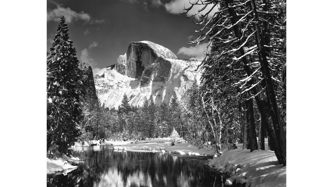 <strong>"Half Dome, Merced River, Winter" (c. 1938). </strong>"This view is one familiar to every visitor to Yosemite Valley, from Sentinel Bridge just past the Chapel," says Adams, but it still "makes me look every time."