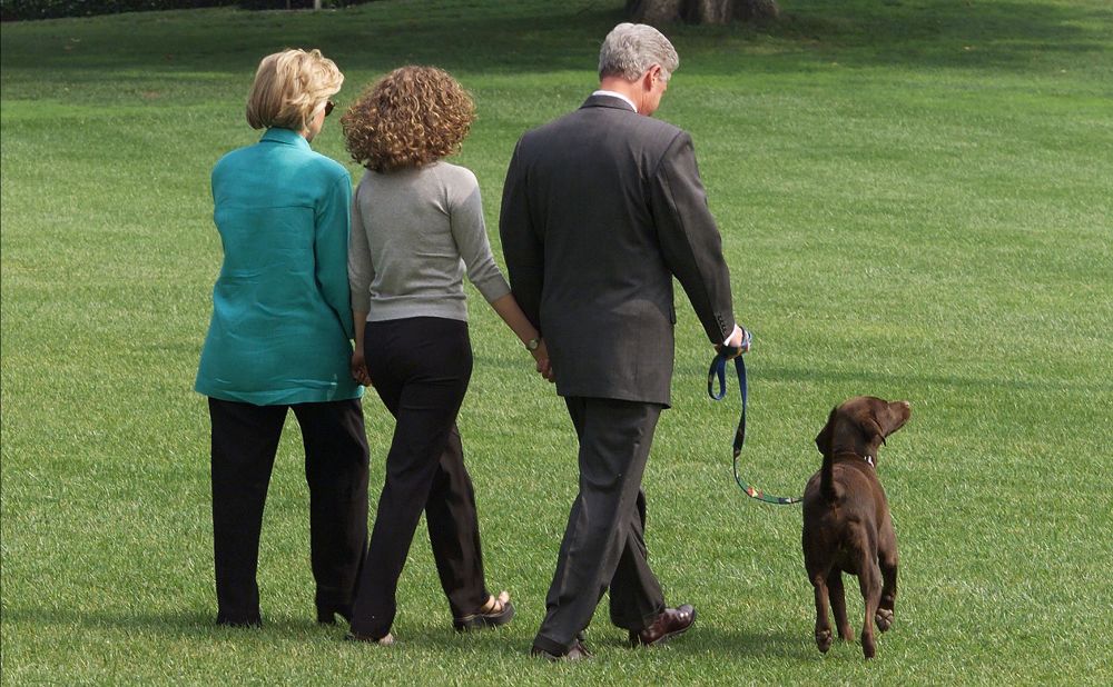 The Clintons and their daughter, Chelsea, depart the White House with their dog, Buddy, in August 1998. They were leaving for a two-week vacation at Martha's Vineyard. The day before, the President gave a televised address regarding his testimony to a federal grand jury in which he admitted to an inappropriate relationship with Monica Lewinsky.     