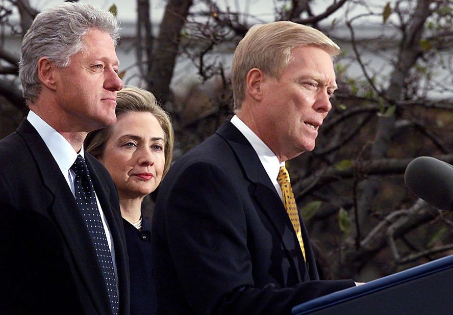 The Clintons listen as House Minority Leader Dick Gephardt addresses the nation oat the White House in December 1998.  It was after the House of Representatives voted to impeach the President on charges of perjury and obstruction of justice related to the Lewinsky scandal. A defiant Clinton rejected calls for his resignation.