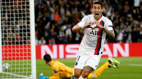 Paris Saint-Germain's Argentine midfielder Angel Di Maria celebrates scoring his team's first goal.