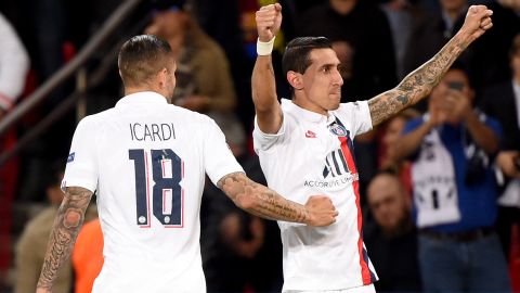 Paris Saint-Germain's Argentine midfielder Angel Di Maria (R) celebrates scoring his team's second goal.