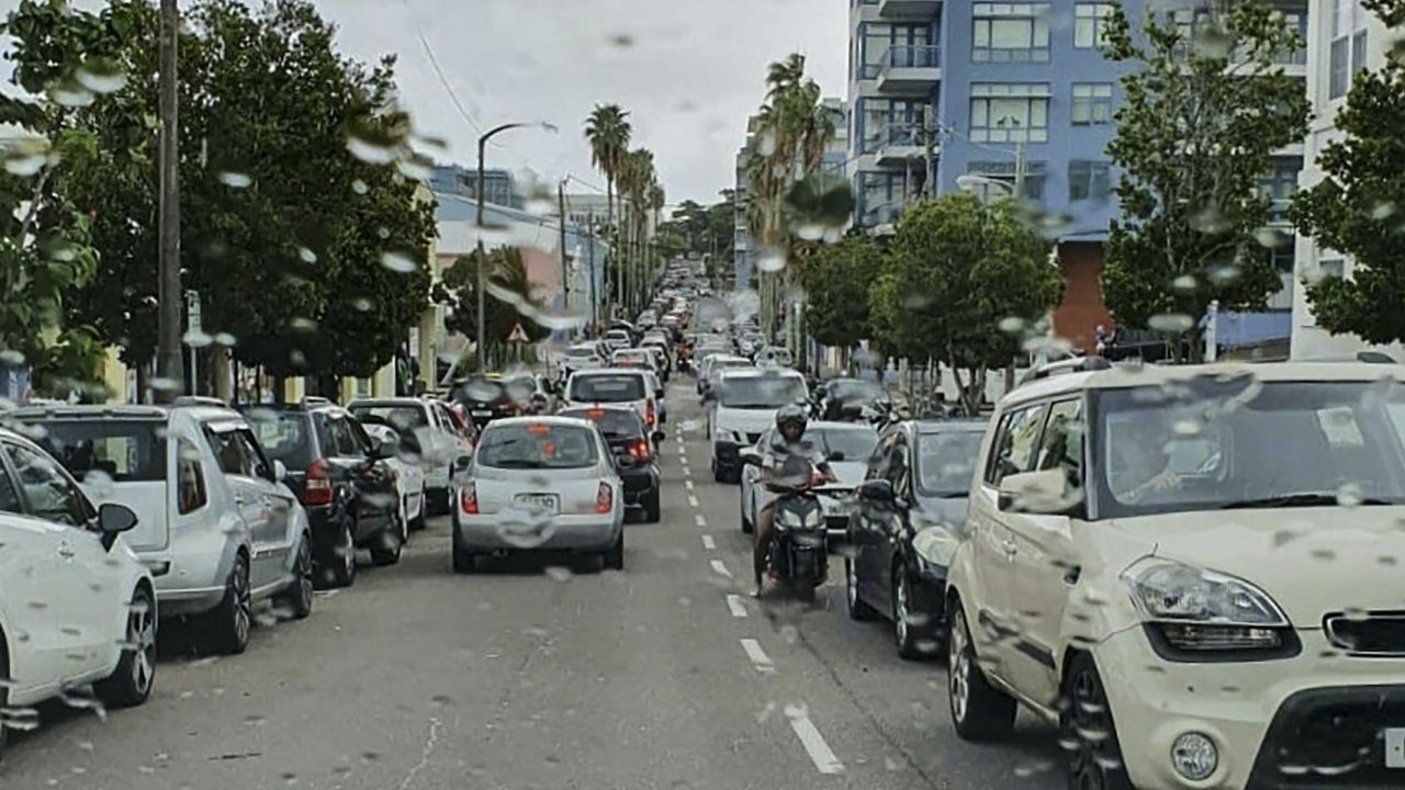 The photo shows rain drops on a windshield as traffic jams formed in Hamilton, Bermuda, on September 18 as people sought shelter. 