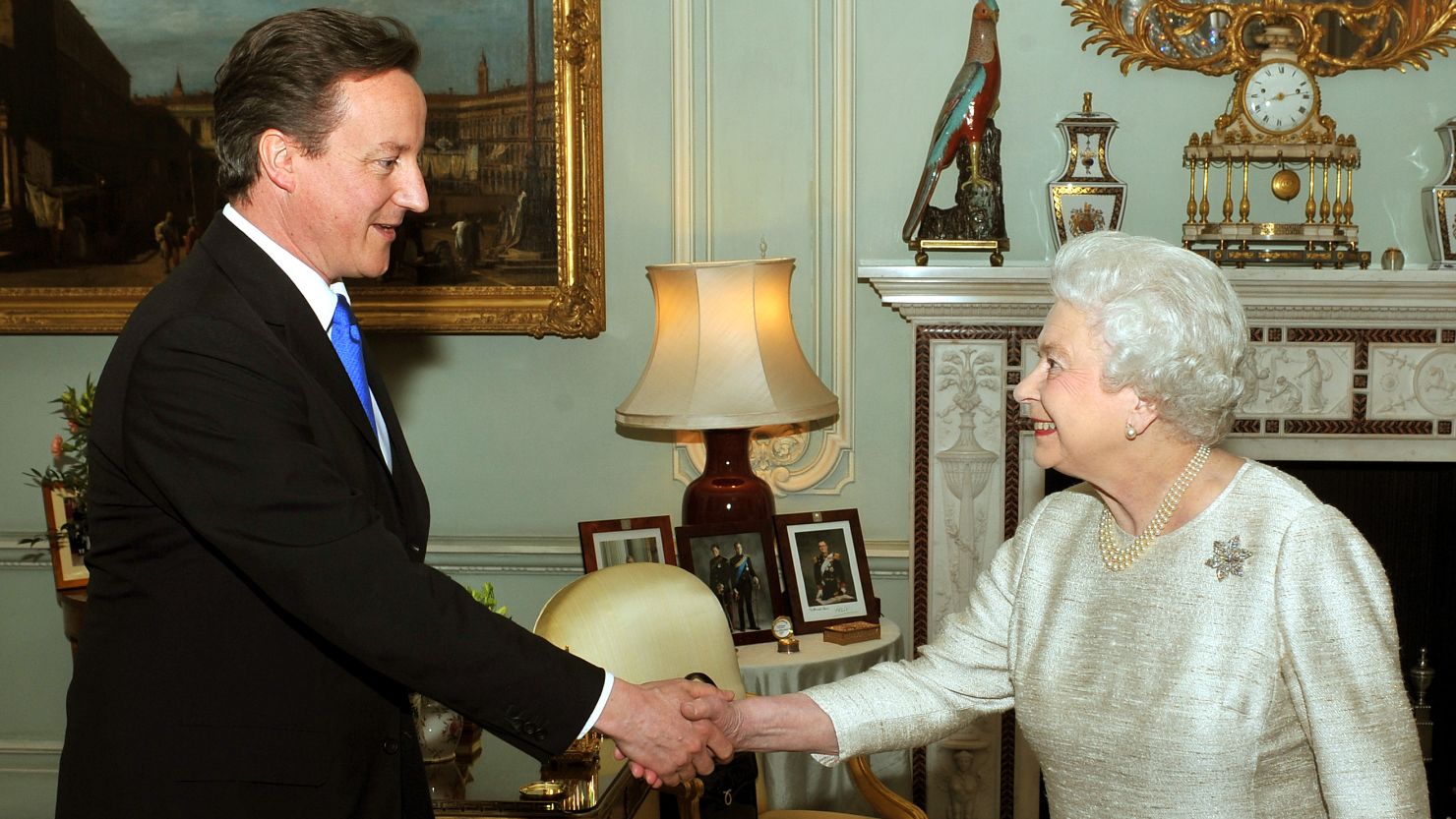 Former British Prime Minister David Cameron pictured with Queen Elizabeth II in 2010.