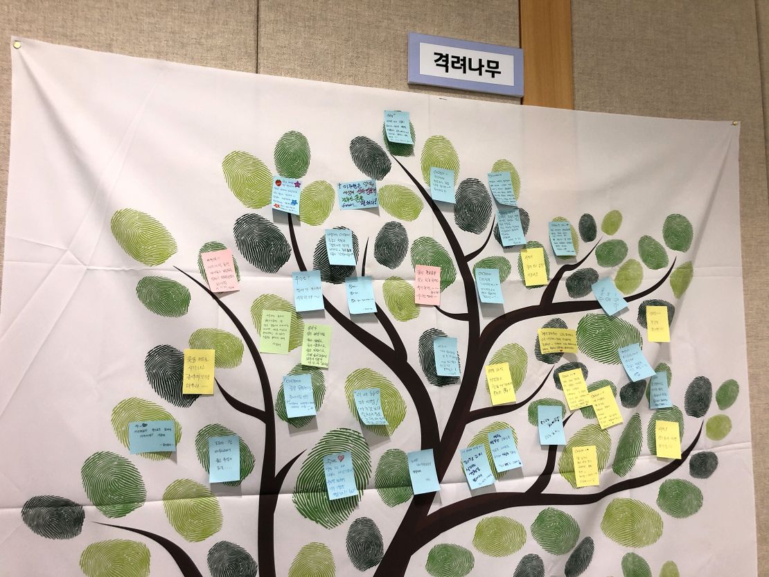 Parents of smartphone addiction campers left encouraging messages on the wall of the camp's activity room in Cheonan, South Korea.