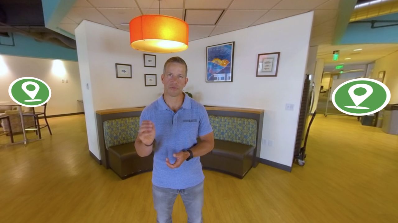 Alexo founder Drew Hancock instructs viewers during an active-shooter VR training session. The imagery appears as it's seen through a VR headset.