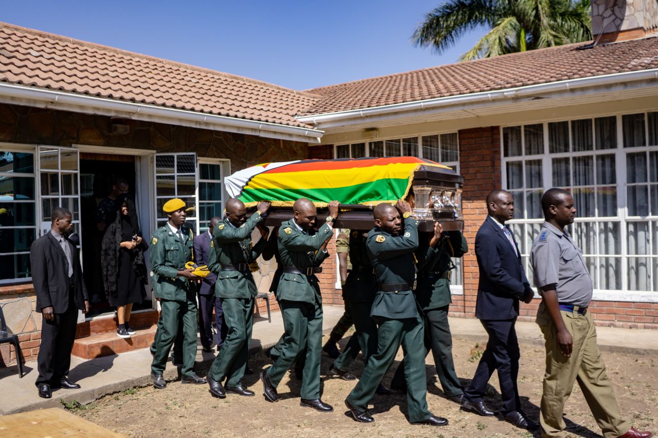 Pallbearers carry the coffin of former Zimbabwe President <a href="https://www.cnn.com/2019/09/13/africa/mugabes-body-battle-burial/index.html" target="_blank">Robert Mugabe</a> for a service at the family homestead in Kutama village, on Tuesday, September 17. Scores of Zimbabweans gathered on Wednesday, September 11, to pay their respects to Mugabe, whose body was repatriated from Singapore. Following a weekend state funeral with African leaders in the capital of Harare, Mugabe's remains arrived in his home village on September 16 for a subdued farewell. 