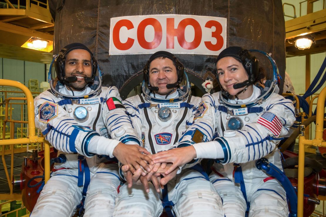 Hazzaa Almansoori (left) and crewmates Oleg Skripochka of Roscosmos (center) and Jessica Meir of NASA (right) prepare for their space mission in Baikonur Cosmodrome in Kazakhstan. They will launch on the September 25 on the Soyuz MS-15 spacecraft to the International Space Station.