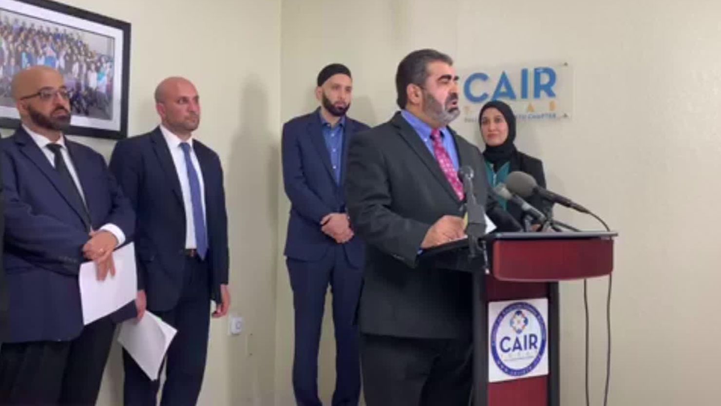Abderraoof Alkhawaldeh addresses reporters at a CAIR press conference on Thursday after he said his American Airlines flight was canceled due to a security concern.