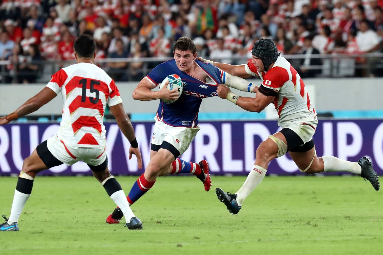 The Rugby World Cup got underway on September 20 as host Japan played Russia in the tournament's opening match. Russia's Nikita Vavilin is tackled by Japan's Pieter Labuschagne.