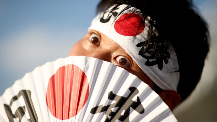 CHOFU, JAPAN - SEPTEMBER 20: A Japan fan poses for a photo outside the stadium prior to the Rugby World Cup 2019 Group A game between Japan and Russia at the Tokyo Stadium on September 20, 2019 in Chofu, Tokyo, Japan. (Photo by Cameron Spencer/Getty Images)