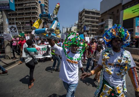 Around a thousand protesters, some wearing outfits made from plastic bottles and bottle-tops to raise the issue of plastic pollution, march in the streets of Nairobi, Kenya.