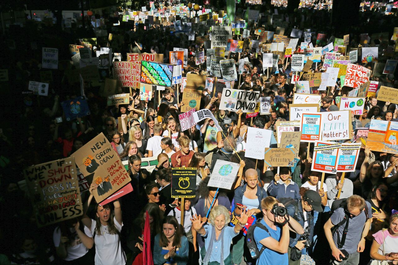 Protesters participate in the UK Student Climate Network's demonstration in London.