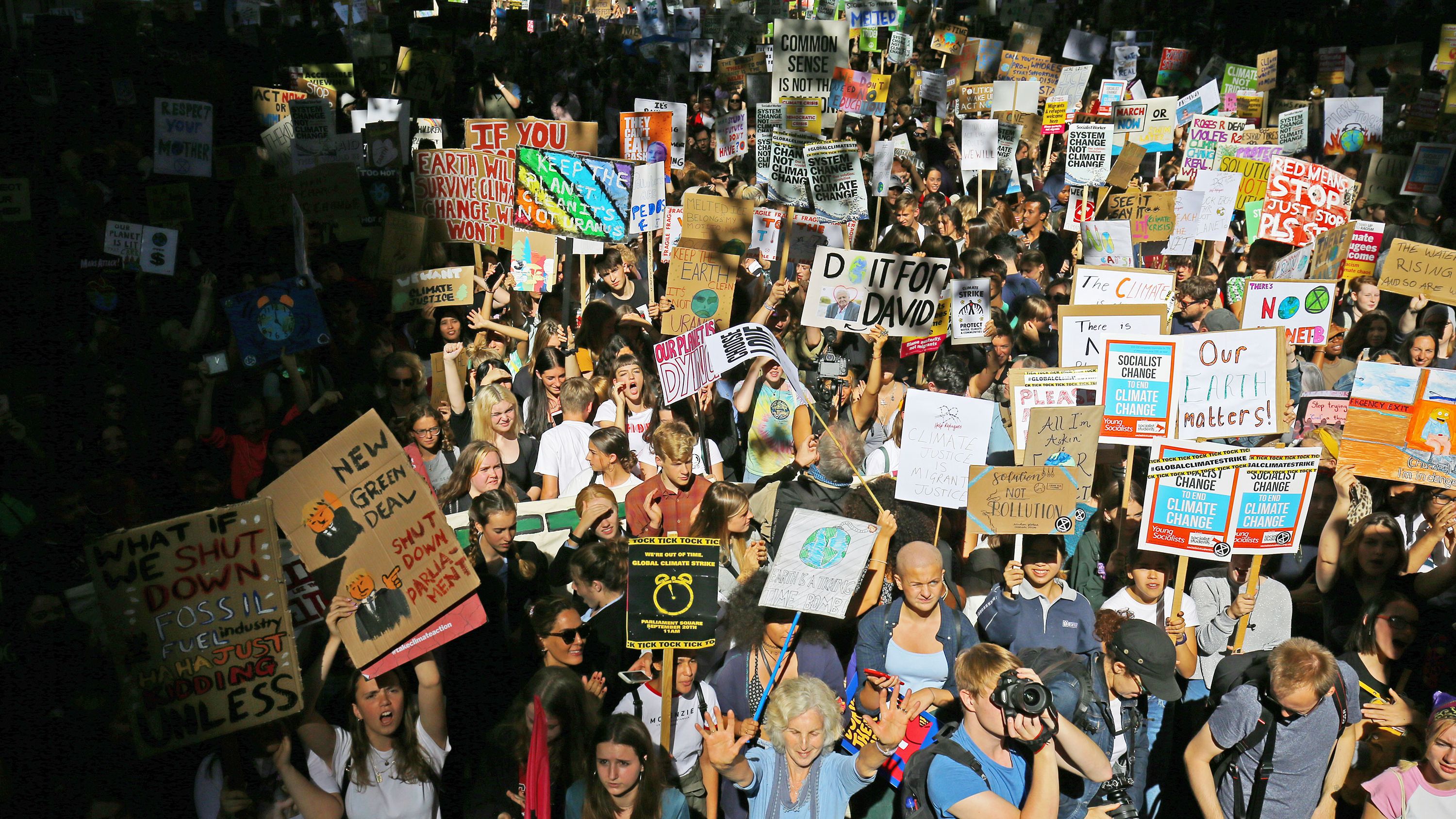 Protesters participate in the UK Student Climate Network's demonstration in London.