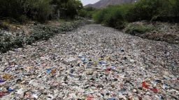 TOPSHOT - Garbage floats along a river in Ajmer in the Indian state of Rajasthan on May 8, 2018. (Photo by HIMANSHU SHARMA / AFP)        (Photo credit should read HIMANSHU SHARMA/AFP/Getty Images)