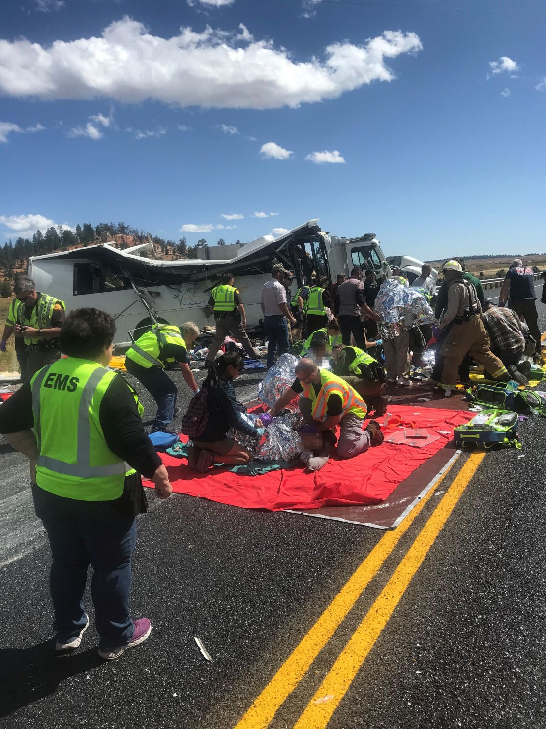 About a dozen passengers suffered critical injuries during the crash. CNN has obscured parts of this image because the condition of the victims could not be verified. 