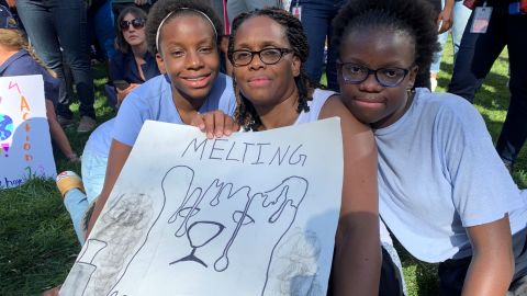 Dr. Karen Stephenson and her two daughters attended a rally in New York.