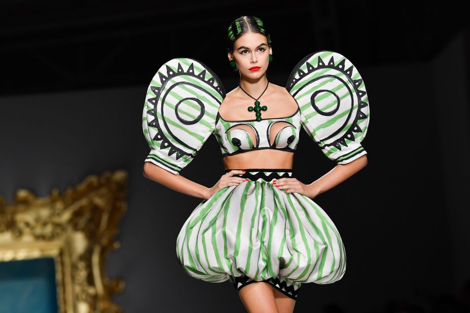 Kaia Gerber models for Moschino's SS20 show. Scroll through the gallery for other highlights from Milan Fashion Week. 