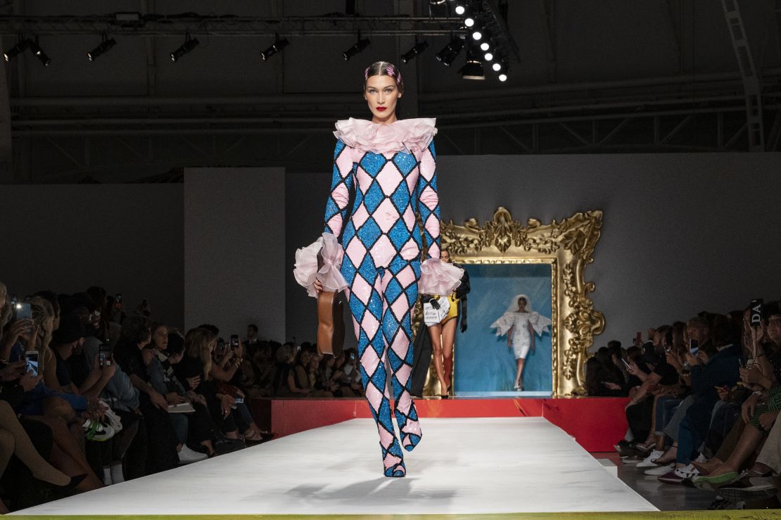 Bella Hadid walked the runway at the Moschino show as Picasso's harlequin. 