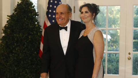 Rudy Giuliani and Maria Ryan arrive for a State Dinner at the White House.