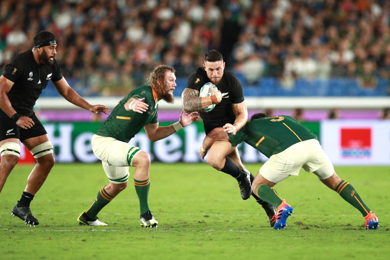 New Zealand has never lost a World Cup group game but were made to work for their 23-13 win by South Africa.