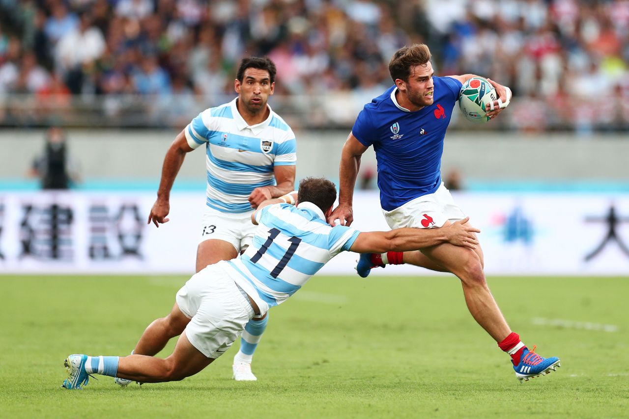 Matias Moroni of France fends off a tackle by Ramiro Moyano of Argentina. The Pumas had a chance to win the game but Emiliano Boffelli was unable to put over a last-minute penalty.