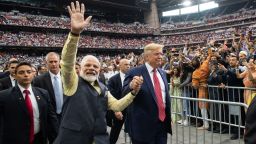 US President Donald Trump and Indian Prime Minister Narendra Modi attend "Howdy, Modi!" at NRG Stadium in Houston, Texas, September 22, 2019. - Tens of thousands of Indian-Americans converged on Houston on Sunday for an unusual joint rally by Donald Trump and Narendra Modi, a visible symbol of the bond between the nationalist-minded leaders. With many in the crowd decked out in formal Indian attire or the signature saffron of Modi's Bharatiya Janata Party, the event kicked off in a football stadium with a Sikh blessing, boisterous bhangra dancing and, in a nod to local customs, cheerleaders in cowboy hats. (Photo by SAUL LOEB / AFP)        (Photo credit should read SAUL LOEB/AFP/Getty Images)
