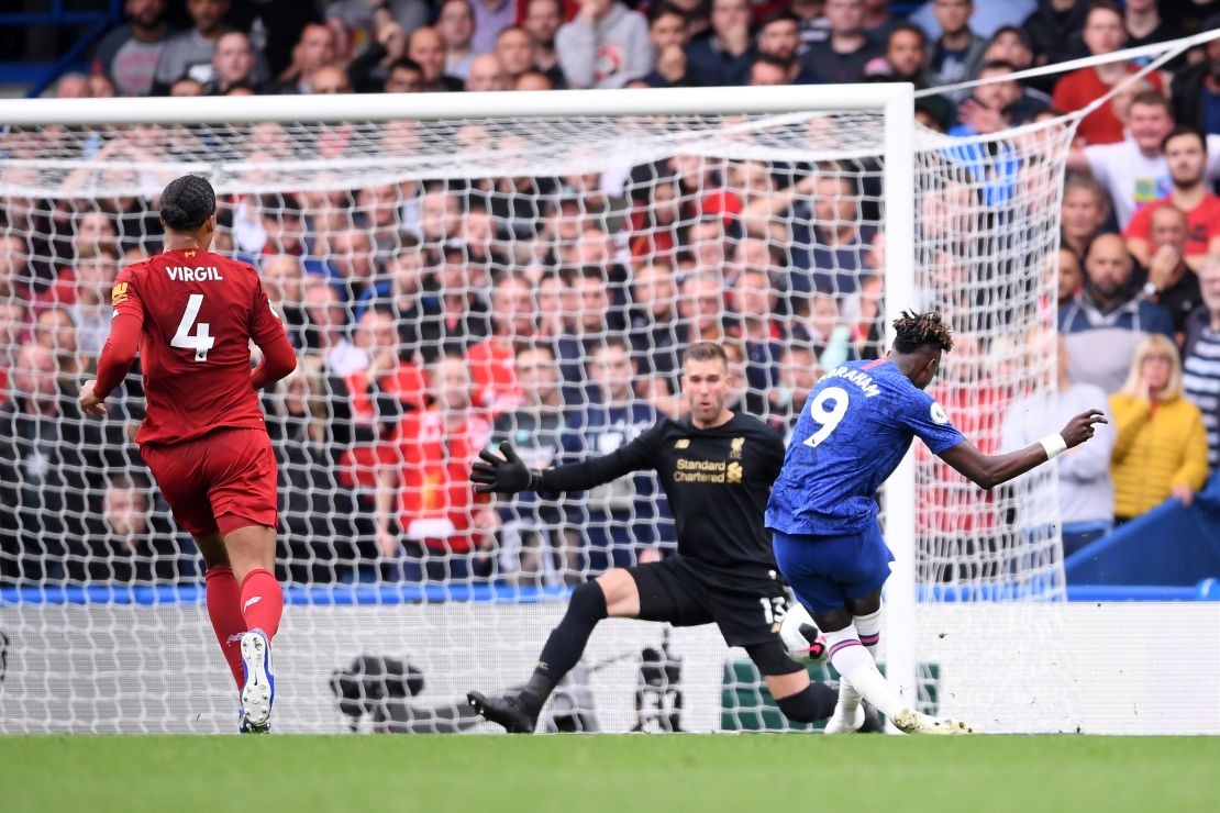 Tammy Abraham has his shot saved by Liverpool goalkeeper Adrian in the first-half. 