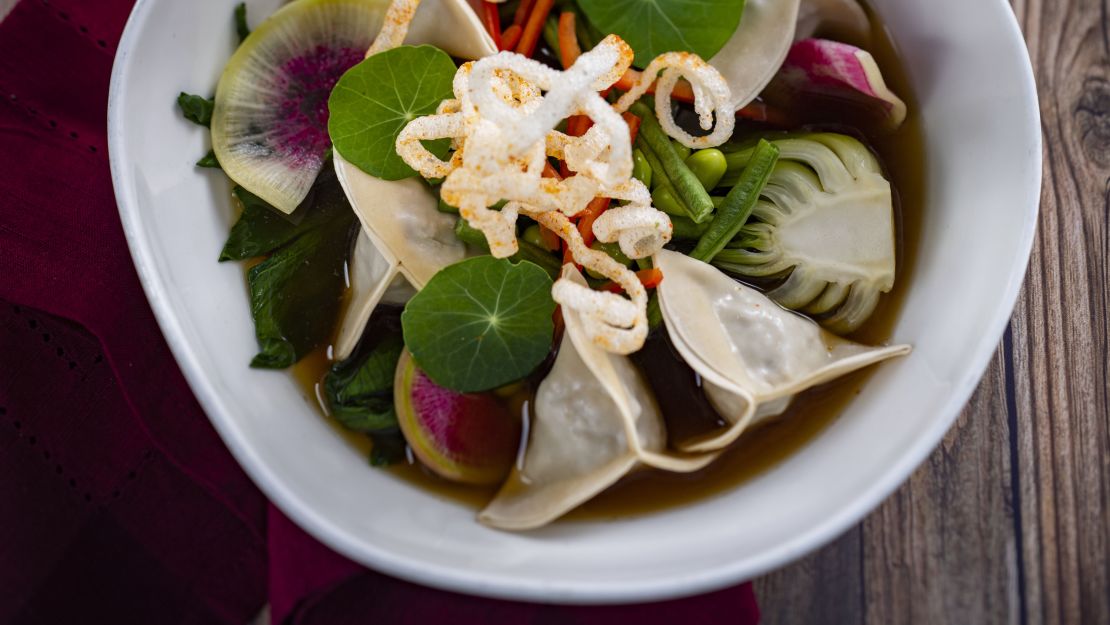 Disney is rolling out new plant-based options in every dining location at its US parks, like Steamed Asian Dumplings at Le Cellier, a steakhouse in Epcot.  