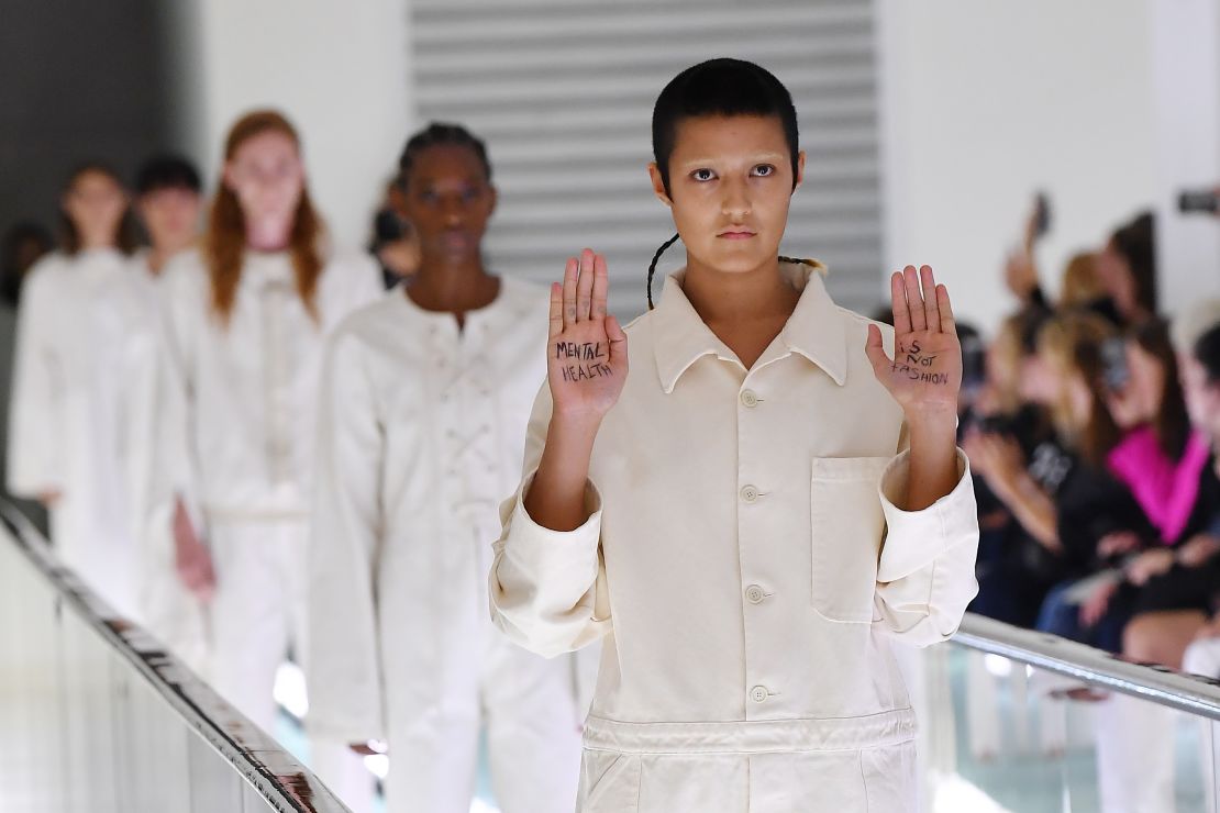 At the Gucci Spring-Summer 2020 show, model Ayesha Tan Jones held her hands up, where she had written, in protest: "Mental health is not fashion". 