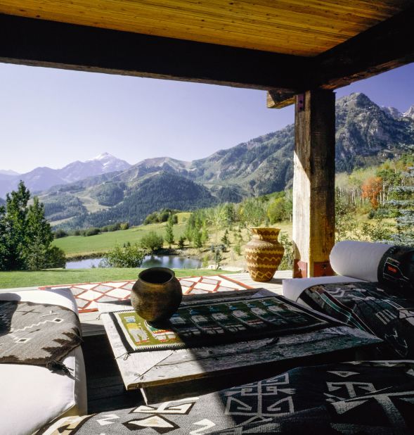 An open-air pavilion at actor Robert Redford's residence in Sundance Mountain Resort in Utah. Items pictured include a Teec Nos Pos rug (c.1900), a 1920s Navajo diamond patterned rug and a Lukachukai rug.