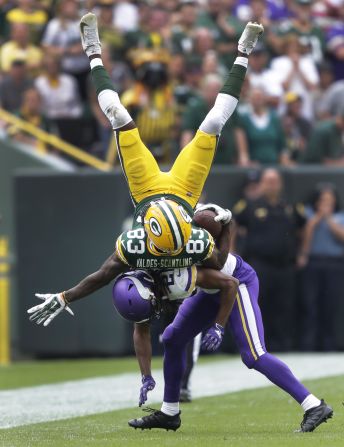 Green Bay Packers wide receiver Marquez Valdes-Scantling is tackled by Minnesota Vikings cornerback Trae Waynes during the third quarter of their football game at Lambeau Field, on Sunday, September 15.