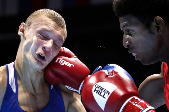 Andy Cruz of Cuba punches Ilya Popov of Russia during the 2019 AIBA World Boxing Championships. Cruz won the bout.  