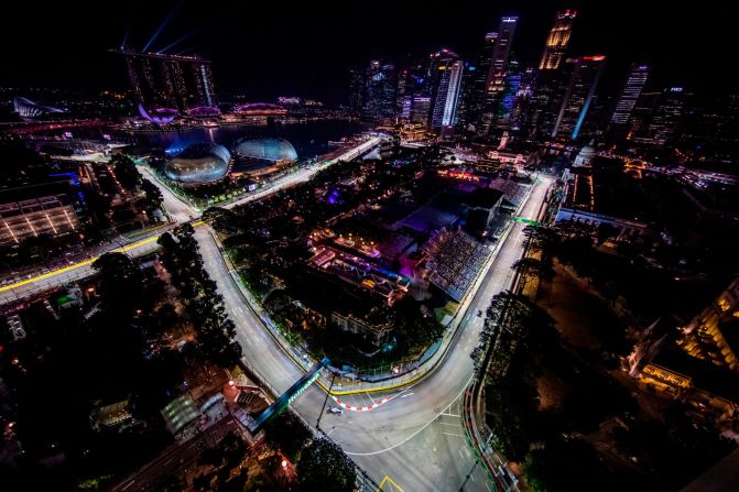 British racing driver Lewis Hamilton practices for the F1 Grand Prix of Singapore at Marina Bay Street Circuit on September 20 in Singapore. The Formula One reigning world champion came in fourth during the Singapore GP. 
