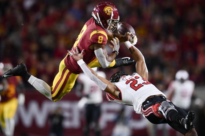 Utah Utes defensive back Julian Blackmon breaks up a pass for Southern California Trojans wide receiver Amon-Ra St. Brown during the second half at Los Angeles Memorial Coliseum in Los Angeles, California, on Friday, September 20.