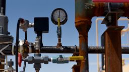 A gas valve sits on a pipeline at the Royal Dutch Shell Plc processing facility in Loving, Texas, U.S., on Friday, Aug. 24, 2018. Royal Dutch Shell Plc?came through a quarter of volatile oil prices to beat earnings estimates, delivering a surge in cash flow the company said will underpin "world-class" returns to investors. Photographer: Callaghan O'Hare/Bloomberg via Getty Images