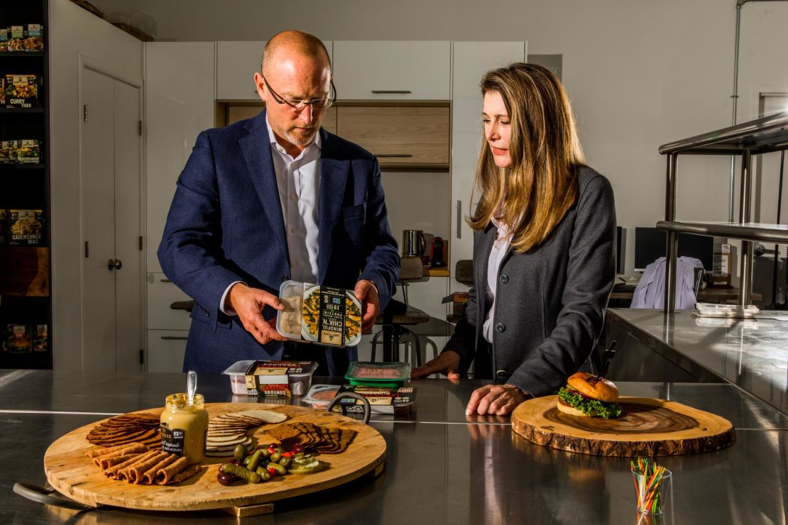 Paul Mankowski, head of research and development for Nestlé Foods, and Kelly Swette showcase products in the test kitchen at Sweet Earth. 
