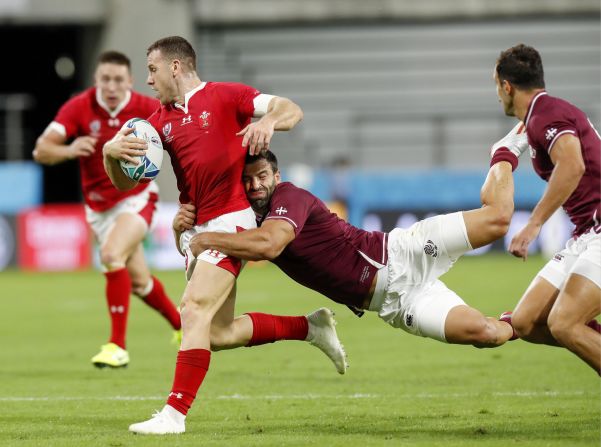 Gareth Davies is tackled by Georgia's Davit Kacharava during an entertaining first half in which Wales showed its class.