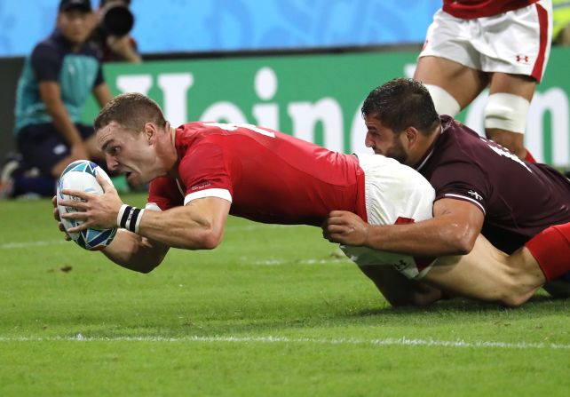 George North reaches out to score a try for Wales during the Pool D encounter.